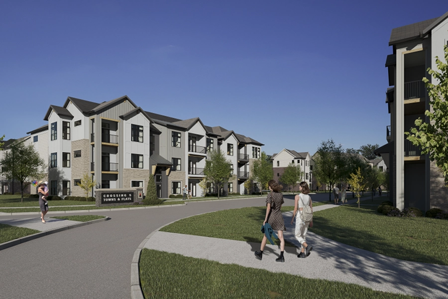 Not all Plainfield apartment communities offer coach homes like Crossing 5 does. Two women walking through an apartment community